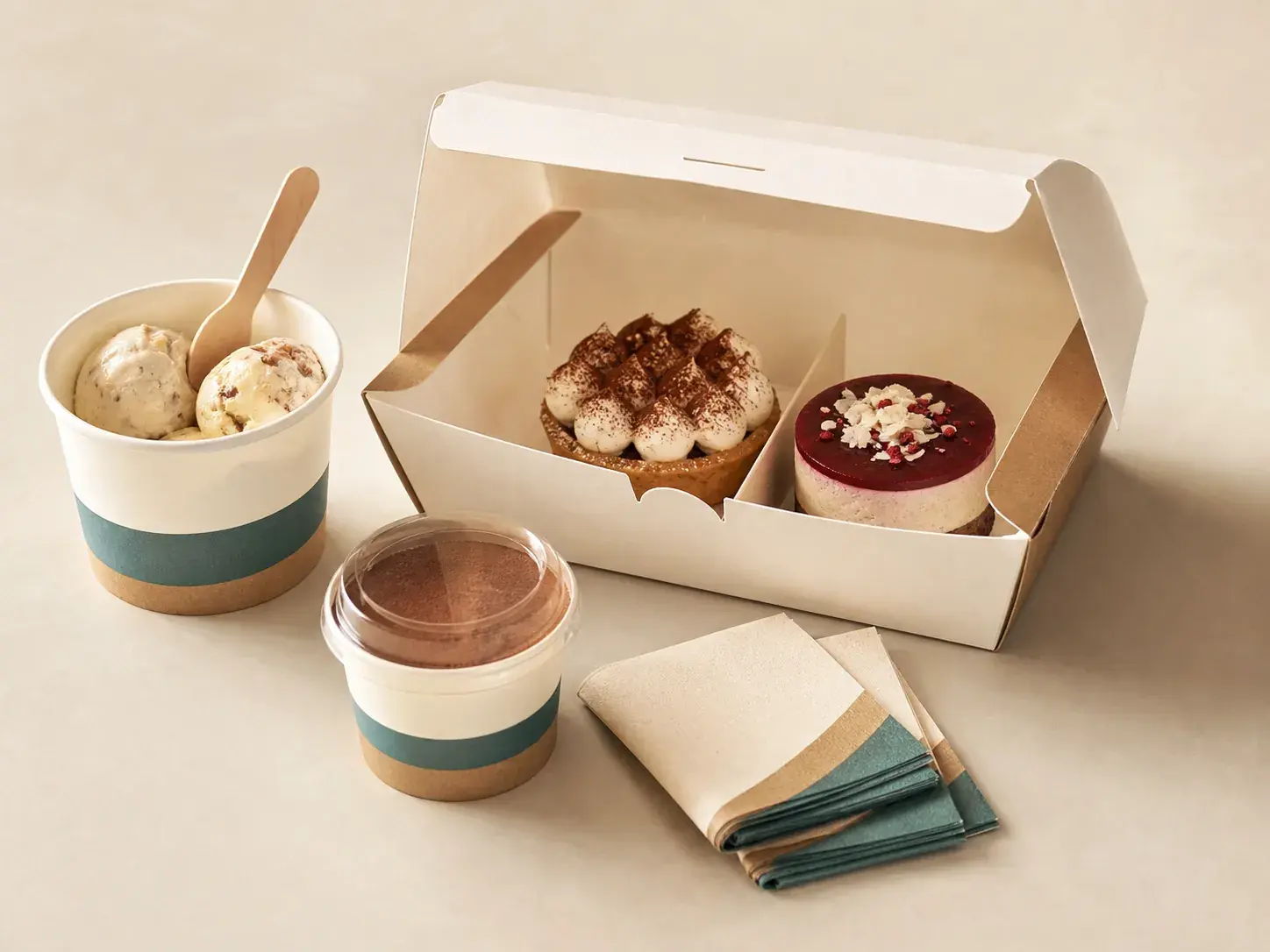 Pastry carton, ice cream cups, dessert cup, spoon and napkins